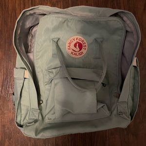 Used mint color fancy forest backpack
